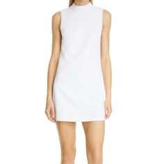 On Sale Is The Alice + Olivia Arlena Mock Neck Tunic Dress 6 In A White/ Off White Color. It Is New Without Tags With Defects. There Are Pinholes On The Back Collar Of The Dress (Pictured). The Measurements Are Approximations Length (Shoulder To Hem)- 33 Inches Width (Pit To Pit)- 16.5 Inches White Fitted Mini Dress For Workwear, Fitted White Mini Dress For Work, White Fitted Mini Dress For Work, White Fitted High Neck Mini Dress, Chic White High Neck Dress, Fitted High Neck Daywear Dress, White High Neck Mini Dress For Spring, Fitted High Neck Dress For Daywear, Elegant White High Neck Mini Dress