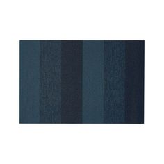 a blue and black striped rug on a white background