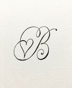 the letter b is inscribed in black ink with a heart on it's side