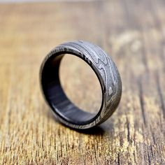 a wooden ring sitting on top of a table