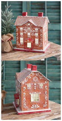 two small gingerbread houses are sitting on top of each other, one is red and the other is white