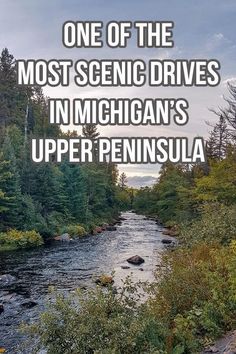 a river surrounded by trees with the words one of the most scenic drives in michigan's upper peninsula