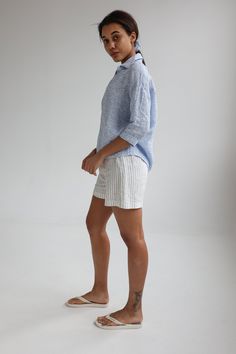 "Buttonless linen shirt for women with 3/4 length sleeves. It is an oversized and loose fit with a deep décolleté, perfect for any occasion or weather. The main distinguishing feature of this shirt is the fabric. Match it with jeans, pants, skirt or shorts. ABOUT US LINEN ID was born from desire to embrace things that actually matter. We aim to create sustainable garments that offer uncompromised design, are versatile and stay with You as time passes. Every LINEN ID piece is handcrafted to help Spring Linen Loungewear Blouse, Collared Linen Tops For Loungewear, Summer Collared Linen Blouse, Summer Linen Collared Blouse, Collared Linen Blouse For Beach, Linen Tops With 3/4 Sleeves For Daywear, Casual Linen Blouse With 3/4 Sleeves, Summer Linen Blouse With 3/4 Sleeves, 3/4 Sleeve Linen Tops For Beach