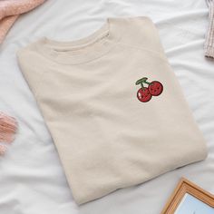 Wrap yourself in warmth and individuality with our embroidered sweatshirt. Crafted with passion, each piece offers unrivaled comfort and a perfect fit. Embrace winter days or relaxed evenings with the softness of cotton and polyester, making it your ultimate go-to. We've put a lot of thought into creating designs that are all about having fun and letting your personality shine. So go ahead and express yourself! ✨ Pre-shrunk ✨ 1x1 athletic rib-knit collar with spandex ✨ Air-jet spun yarn with a s Casual Winter T-shirt With Embroidered Logo, Casual T-shirt With Embroidered Logo For Winter, Cotton Sweater With Embroidered Logo, Casual Long Sleeve Sweater With Embroidered Logo, Winter Crew Neck Sweatshirt With Custom Embroidery, Casual Embroidered Winter T-shirt, Casual Long Sleeve Tops With Custom Embroidery, Casual Embroidered Long Sleeve T-shirt, Casual Long Sleeve Embroidered T-shirt