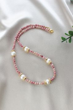 The appearance of natural stones can vary due to their unique characteristics and natural variations in color, size, and pattern. The necklace is sent in an elegant gift box. You can safely send it to your loved ones. Rhodonite can help promote inner peace and emotional balance.  Rhodonite can enhance empathy, helping you better understand the feelings of others and communicate more effectively. Rhodonite can assist in managing anger and temper. Its soothing effects can promote calmness and tran Managing Anger, Wearing Pearls, Pink Rhodonite, Necklace With Pearl, Clear Negative Energy, Unique Characteristics, Emotional Balance, Bohemian Necklace, Les Sentiments