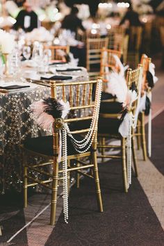 the tables are set with black and white decorations