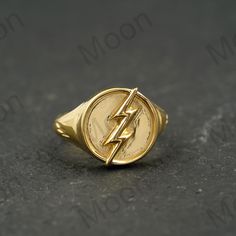 Flash Ring,Sterling Silver Ring,Flash Point Ring,DC Comics,DC Jewelry,14k Gold Ring,Unisex Ring,Stackable Ring,Barry Allen Ring,Cosplay Ring ◈ Item Details ◈ Metal: 925 Sterling Silver  Style: Gemstone Rin ABOUT GEMSTONE - ♥ Purification ♥ Serenity ♥ Protection ♥ Wisdom ♥ Balance ♥ Strength ♥ Friendship ♥ Love ♥ Positive thinking ♥ Sensitivity S I L V E R J E W E L R Y C A R E Silver is not the best friend of oxygen and sulfur; it can be oxidized and tarnished from time to time it is the nature of silver. To keep the silver shiny and prevent it from oxidizing fast, we would recommend the following instructions; * Avoid any chemical agents including perfume, makeup, and hair spray. * Avoid wearing silver jewelry to the beach, shower, or exercise. * Remove before you sleep, clean it with a s Dc Jewelry, Flash Ring, Flash Point, Beach Shower, Barry Allen, Fancy Gifts, Hair Spray, Silver Style, Unisex Ring