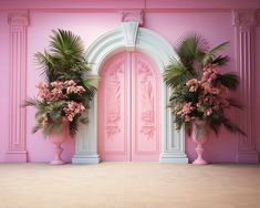 two large pink doors and some flowers in vases