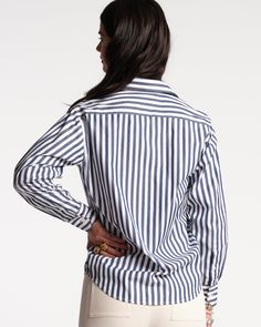 Our Perfect Button Down is that classic top that never leaves your wardrobe. Updated for Spring in a new navy and white stripe poplin, this basic goes with just about everything in your closet. Women’s button up with bracelet-length sleeves and classic shirt collar Updated in bold navy & white stripes Made with cool & crisp 100% cotton poplin Detailed with embroidered heart on collar & FV’s signature XO on cuff Made in Turkey Classic Pinstripe Cotton Blouse, Classic Shirt With Striped Collar For Everyday, Pinstripe Shirt With Button Cuffs For Work, Striped Work Shirt With Button Cuffs, Button-up Tops With Striped Cuffs For Daywear, Striped Shirt With Button Cuffs For Work, Classic Tops With Striped Collar For Everyday, Business Casual Vertical Stripes Button-up Tops, Classic Top With Striped Collar For Daywear