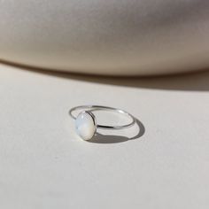 mother of pearl stone set in a bezel on a 925 sterling silver skinny ring band Mother Of Pearl Ring, Silver Pearl Ring, Rose Gold Gifts, Timeless Ring, Pearl Stone, Ring Stack, Oval Ring, Oval Rings, Jewelry Card