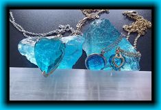 "An assortment of handmade Andara pendants to fit most budgets. These Andaras were personally sourced by me directly from only one of the 2 remaining sources of genuine Andaras here in the US. This listing is for the CYAN ANGELES ANDARAS. THE LARGE HEART PENDANT 1\" LONG AND 3/4\" WIDE AT THE TOP. Professionally diamond cut front and back. Mounted on a sterling silver gold plated setting. Includes an 18\" gold plated chain with a 2\" extension. THE LARGE SQUARE PENDANT 2/3\"  on all sides. Profe Turquoise Aquamarine Necklace For Gift, Gift Turquoise Aquamarine Necklace, Blue Spiritual Heart Pendant Jewelry, Blue Heart-shaped Spiritual Necklace, Spiritual Blue Heart Pendant Jewelry, Spiritual Blue Heart Pendant Necklace, Blue Jewelry For Gifts, Unique Blue Heart Pendant Necklace, Unique Blue Heart-shaped Necklace