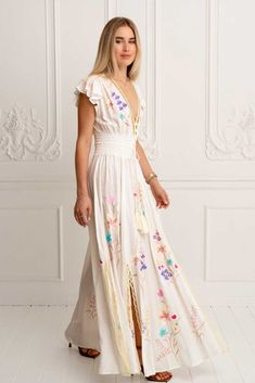 The design team really created a masterpiece with The Summer Glam Maxi in Ivory. With stunning details at the neckline crafted in our traditional crochet technique that creates a see-through effect adding a touch of sophistication and feminine flair to this beauty. With cute little ruffle sleeves for a dimensional effect, ethereal wild flowers embroidered throughout and smocked waist to fit you comfortably (stretches up to 12cm). True to size, this gorgeous gown is soft and floaty with high spli Jeans Long Skirt, Hemant And Nandita, Long Linen Dress, Linen Short, Gorgeous Gowns, Ruffle Sleeves, White Maxi Dresses, Linen Dresses, Skirt Top