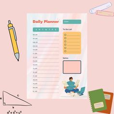 the daily planner is next to a pencil and some other items on a pink background