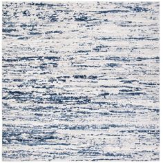 an abstract rug with blue and white colors