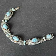 Blue Intricate Design Jewelry Bracelet, Ornate Turquoise Jewelry For Collectors, Antique Silver Cabochon Bracelets, Antique Silver Jeweled Jewelry, Antique Jeweled Silver Jewelry, Antique Blue Bracelet Jewelry, Ornate Turquoise Filigree Jewelry, Ornate Silver Beaded Jewelry, Vintage Turquoise Stone Jewelry