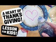 someone is making a heart - shaped thank giving card for their child's birthday