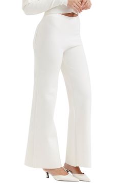 A mid rise and cotton-blend fabrication add modern comfort to pull-on pants designed with flared legs for trendsetting appeal. Exclusive retailer Pull-on style Back patch pocket 70% cotton, 30% nylon Dry clean Imported Cheap White Flare Bottoms, White Fitted Flare Bottoms, Modern White Cotton Flare Jeans, Non-stretch Flare Cotton Pants, White Wide-leg Bottoms With Ribbed Waistband, Bearded Lady, House Of Cb, Resort Outfit, Perfume Gift Sets