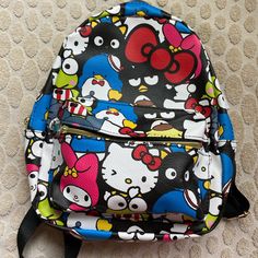 Condition: Brand New! Hello Kitty & Friends Mini Backpack!! Item Details: As Seen In Pictures Listed Used Or Unused: New Size: Small/Mini Backpack Disclaimers: None!! Can Provide Measurements (If Needed) Act Now!! Great Deals!! Offers Welcomed!! I Paid Full Price, So You Dont Have To!! #Covidfreehome #Smokefreehome #Petfreehome Feel Free To Ask Me Any Questions Down Below! Trendy Hello Kitty Print Bag For Back To School, Trendy Hello Kitty Print Back To School Bag, Casual Everyday Backpack With Cat Design, Fun Daily Use Standard Backpack, Cute Hello Kitty Print Backpack For Daily Use, Black Kawaii Backpack For Everyday Use, Trendy Hello Kitty School Bag, Trendy Backpack With Cat Design For Daily Use, Trendy Cat Design Backpack For Daily Use