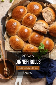 vegan dinner rolls made with spelt flour in a cast iron skillet on a table