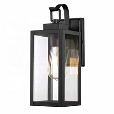 Capturing minimalist style. With crisp lines and sharp angles, the Black Moderntique Outdoor Wall Light relates perfectly to the clean look of contemporary architecture. Its rectangular shade with clear glass panes offers a sleek design while allowing bright illumination to shine on entrances, patios and terraces. Done in a timeless metal finish and made out of solid brass, this exterior light fixture improves your home's curb appeal as well as nighttime visibility. FEATURES Can be used indoors Beautiful Lighting