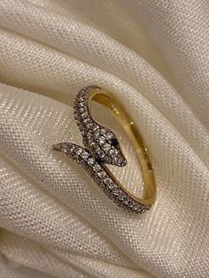 "ABOUT PRODUCT This 14K Gold Snake Ring with CZ Diamonds is beautifully designed and hand crafted with our associates to make this a special gift for your loved ones. Knowing the value of our customers, We prepare each piece with extra care and attention.  ITEM DETAILS Material: 14K Gold Approx:  1.90 gram Available colors: Gold, Rose Gold, White Gold Available Sizes: 4 US to 11 US ✪ 14k Solid Gold ( Certification will be included with your order ) ✪Available 14K White, Yellow, Rose Gold (also i Fine Jewelry Open Snake Ring As Promise Ring, Fine Jewelry Cubic Zirconia Snake Ring Gift, White Gold Snake Ring, Fine Jewelry Promise Ring, White Gold Snake Ring As A Gift, White Gold Snake Ring For Promise Occasion, White Gold Snake Ring For Promise, Gold Snake Ring With Diamond Accents For Gift, Gold Snake Ring With Diamond Accents As Gift, Adjustable Fine Jewelry Snake Ring For Anniversary