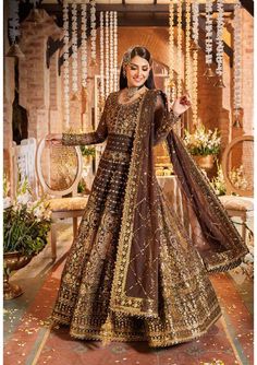 Classic Heavily Embellished Gold Pakistani Wedding Dress Pishwas comes with Floral designs and geometric patterns inspired by cultural elements pay homage to tradition, giving the whole a timeless appeal. In addition to its decorative appeal, embroidery carries the essence of tradition and craftsmanship. Detailed Description: SKU: WB426 Detailing: Embroidery, Beads, Sequins, Motifs, Sitara, Threads, Floral designs Color: Gold Fabric: Raw silk, Net, Organza Design: Fully Embellished Dress with Embroidery, Floral designs Event: Bridal wear, Wedding Traditional Reception Gown With Dabka Work, Traditional Resham Embroidered Gown For Reception, Traditional Gown With Resham Embroidery For Reception, Gold Gown With Dabka Work For Traditional Ceremonies, Traditional Gown For Reception With Resham Embroidery, Traditional Reception Gown With Resham Embroidery, Semi-stitched Gown For Navratri And Traditional Ceremonies, Gold Floor-length Anarkali Set For Traditional Ceremonies, Semi-stitched Gown For Diwali And Traditional Ceremonies