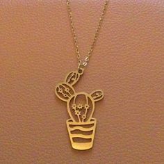 Brand New Boutique Item In Original Packaging! Very Cute Cactus Pendant Layering Necklace In Gold Plated Solid Stainless Steel. Highly Detailed. Non Adjustable Chain With Clasp Closure. 9” Chain Without Extender. 10” Total Length, 1” At Widest. All Of My Boutique Jewelry Is Nickel Free And High Quality! Please Check Out My Closet For An Extensive Collection Of High End Designer And Boutique Jewelry Pieces! Tags Free People Anthropologie Zara Madewell J. Crew Urban Outfitters Modcloth Betsey John Casual Gold Charm Necklaces As Gifts, Casual Gold Charm Necklaces For Gift, Casual Gold Charm Necklace As Gift, Casual Stainless Steel Necklaces For Gifts, Casual Stainless Steel Necklaces As Gift, Casual Stainless Steel Necklace For Gifts, Casual Stainless Steel Necklace As A Gift, Mexican Jewelry Gold Pendant Necklace, Southwestern Engraved Pendant Necklace