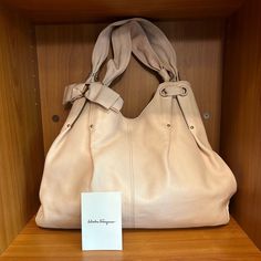 Authentic Salvatore Ferragamo Tote Bag Leather Blush Pink Made In Italy Preloved Condition. Minor Signs Of Used Like Discoloration On Photo #9 Interior Is Clean, Snap Button Closure. Expandable. See Pictures For Details Before Purchase. Approximately 15" X 11" Large Designer Beige Shoulder Bag, Designer Large Beige Shoulder Bag, Large Beige Designer Shoulder Bag, Large Designer Beige Satchel, Large Beige Designer Satchel, Elegant Large Bag For Errands, Designer Shoulder Bag With Rolled Handles For Errands, Elegant Large Satchel For Shopping, Large Elegant Satchel