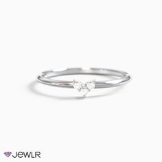 This dainty cluster design adds sparkle and dimension to your ring stack. Perfect for everyday wear, this ring features three 1.25mm round stones. Dainty Stackable Heart Ring, Fine Jewelry Stackable Three Stone Rings, Dainty Three Stone Diamond Rings, Fine Jewelry Stackable Cluster Ring, Stackable Cluster Ring For Promise, Diamond White Stackable Rings For Promise, Dainty Three-stone Promise Ring, Stackable Cluster Promise Ring, Dainty Stackable White Gold Heart Ring