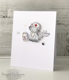 a white card with a cat and nurse's hat on it