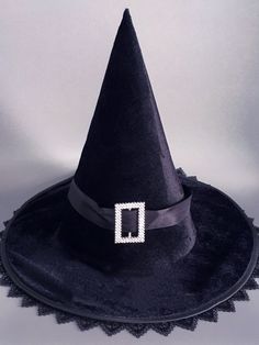 The whole of this hat is black. It is very suitable for people to wear on Halloween day.  This price is for a witch hat only. Black Witchy Hat For Halloween, Brimmed Costume Hats For Fall Parties, Wide Brim Costume Hats For Fall Parties, Fall Party Costume Hat With Wide Brim, Wide Brim Costume Hats And Headpieces For Fall Party, Brimmed Costume Hats And Headpieces For Fall Party, Fall Party Costume Hats And Headpieces With Brim, Fall Party Brimmed Costume Hats And Headpieces, Black Gothic Hat For Costume