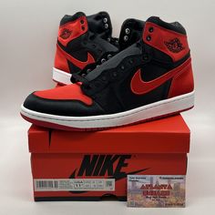 Elevate your sneaker game with these stunning Air Jordan 1 Retro OG 2023 Satin Bred in size 11.5. The classic black, red, and white colorway is perfect for any occasion, while the satin upper material adds a luxurious touch. With the iconic Air Jordan logo and model name, these sneakers are a must-have for any sneaker enthusiast. These athletic shoes are designed for women and have a style code of FD4810-061. They are part of the Air Jordan product line and were released in 2023. Whether you're a seasoned collector or looking to add to your shoe rotation, these Air Jordan 1 Retro OG 2023 Satin Bred sneakers are the perfect addition to any wardrobe. Nike Jordan Air 1, Shoe Rotation, Air Jordan Logo, Jordan Logo, Sneaker Games, Air Jordan 1 Retro, Jordan 1 Retro, Air Jordan 1, Nike Jordan