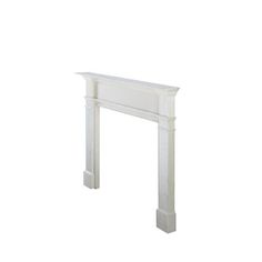 a white fireplace mantel sitting on top of a white floor