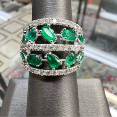 14k White Gold Diamond & Emerald Ring. 2.50 Carats. 6.7 Grams. Size 6.5. Pt2860 Platinum Emerald Ring In White Gold, Oval Multi-stone Emerald Ring In White Gold, White Gold Multi-stone Jewelry For May Birthstone, May Birthstone Multi-stone White Gold Jewelry, Silver Emerald Multi-stone Ring In Platinum, Silver Platinum Emerald Ring With Multi-stones, Silver Platinum Emerald Ring With Multiple Stones, Silver Emerald Ring With Brilliant Pear Cut, Silver Emerald Cluster Jewelry