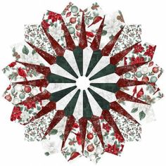 a red, white and green snowflake is featured in the center of this image