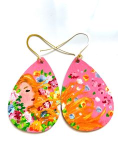 Light weight, one of a kind, hand painted, wooden earrings with design of a woman with flowers Long Plaid Skirt, Painted Dog, Woman With Flowers, Dog Earrings, Painted Earrings, Brown Hats, Earring Ideas, Wooden Hand, Wooden Earrings