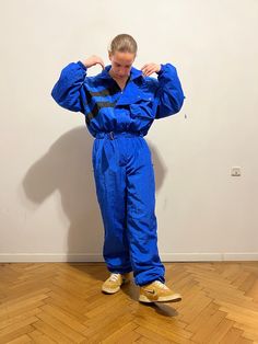 Outstanding Vintage Blue Kn Ski suit overall Very good condition Windproof and waterproof Size: oversized L/XL men  (Note: we only have ONE piece in stock. If more than one size is mentioned, it means this item will work on a range of sizes.) Models' measurements in cm: Height 180 Weight 70 kg Shoulders width: 46 Chest circumference 90 Waist circumference 78 Hips circumference 90 Leg inseam (from pelvic area to heel) 89 Sleeve (from shoulder to hands knuckles) 70 by Dragoș  ✈️        FAST SHIPPING with DHL EXPRESS! ☎️+ 💌 Provide phone no and email for DHL courier to have a smooth shipping. We deliver worldwide with DHL Express. ▪️ European countries         1-2 days ▪️ Canada/US/Japan/etc.    3-5 days  🟥  Returns & Exchange Policy We accept returns only after you receive the parcel and j Long Sleeve Overalls With Pockets For Outdoor, Blue Long Sleeve Utility Overalls, Blue Overalls With Pockets For Streetwear, Blue Utility Overalls For Streetwear, Long Sleeve Overalls With Pockets For Streetwear, Ski Suit, Ski Suits, Waist Circumference, Sport Fitness