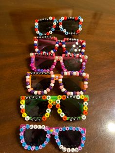 several pairs of sunglasses made out of beads