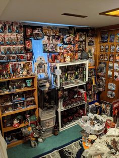 a room filled with lots of toys and collectibles