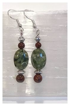 Green Moss Agate dangle and drop earrings with mahogany Obsidian, dangle and drop earrings, unique earrings, boho jewelry, gemstone earrings by soulshinealign on Etsy Handmade Oval Brown Earrings, Mahogany Obsidian, Green Moss Agate, Symbolic Jewelry, Agate Earrings, Saint George, Earrings Unique, Unique Gifts For Her, Jewelry Gemstone