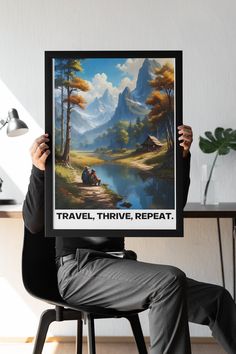 a man sitting in a chair holding up a poster that says travel, thrve, repeat