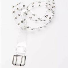 Pair Your Look With A Little Rock N Roll Glam Wearing This Clear Belt Studded With Star Grommets. Complete With A Square Buckle And Double Prong Closure. Content + Care - 100% Pvc - Spot Clean - Imported - Width: 1.5” Sold Out On Website. Clear Belt, Urban Outfitters Accessories, Rock N Roll, Urban Outfitters, Buckle, Women Accessories, Stars, Women Shopping, Silver