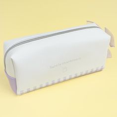 This kawaii pencil case features cute watercolor-like prints of Sanrio Characters dressed as babies! It even showcases a sheer ribbon zipper pull for added cuteness. Use this case to store your writing materials. Made from synthetic leather White Stationery Pouch With Pen Slots, Kawaii Rectangular Pencil Case With Zipper Closure, White Portable Pencil Cosmetic Bag, White Pouch Stationery For School, School Stationery Pouch In White, White Stationery With Pen Slots For Everyday Use, White Stationery With Pen Slots, Portable White Pencil Case Pouch, White Zipper Pouch Cosmetic Bag For School