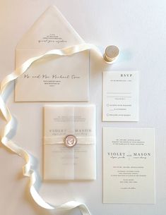 the wedding stationery is laid out and ready to be used