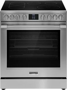 an oven with the door open and two burners on each side, in stainless steel