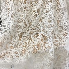 Guipure wedding dress lace fabric, boho alencon bridal gown fabric, off white crochet couture lace fabric for wedding dress Such a detailed crochet wedding lace fabric with alencon lines Width is about 140cm , price is for one yard more buying will be cut as one piece my shop link: http://www.etsy.com/shop/lacetime ------------------------------------------------------ ---------------------------------------------------------------- --------------------------------------------------------------- Elegant White Wedding Dress With Lace Patchwork, Delicate White Lace Wedding Dress, Bohemian Scalloped Lace In Cream, Bohemian Cream Scalloped Lace, Cream Bohemian Scalloped Lace, Cream Lace Dress With Lace Back, Delicate White Lace Dress, Elegant White Lace With Lace Back, Cream Tulle Fabric With Crochet Lace