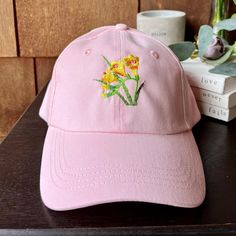 Freesia Flower Hat, Custom Baseball Caps Unwashed with Adjustable Velcro Closure, Embroidered Floral Hats Women, Personalized Mother's Day Gardening Gifts for Her, Yellow Flowers Pink Dad Hat - CUSTOM TEXT available on the back of cap, above strap opening. - THREAD COLOR (optional): Choose a color for *custom wording on back* & write into personalization box. Default: white or black thread, depending on cap color. - Custom wording on the back of cap will be embroidered according to what dimensio Cheap Pink Embroidered Baseball Cap, Embroidered Baseball Cap For Beach In Spring, Pink Embroidered Baseball Cap For Summer, Summer Pink Embroidered Baseball Cap, Embroidered Brimmed Spring Hats, Spring Embroidered Brimmed Hat, Spring Baseball Cap With Floral Embroidery, Spring Embroidered Pink Baseball Cap, Brimmed Hats With Embroidered Logo For Spring