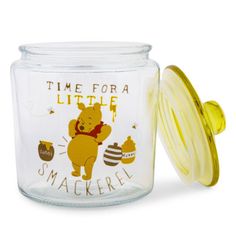 a glass jar with a yellow lid that says, time for a little smacker