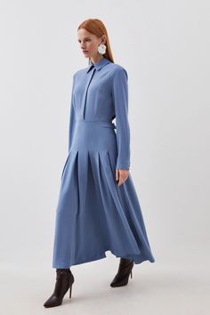 This instantly-elegant shirt dress is tailored with languid proportions, rendered from a soft jersey fabric that effortlessly cascades to an ankle-grazing length. This point-collar piece is cut with a sculpted waist that defines the long-sleeved bodice before easing into a flowing skirt. Pair this dress with leather boots for elevated style.Long sleevesMaxi lengthShirt dressSoft pleats Blue Long Sleeve Midi Dress, Modest Fashion Everyday, Dressy Casual Dress, Long Sleeve Modest Dresses, Casual Modest Dress, Its Okay To Not Be Okay Outfits, Midi Shirt Dress Outfit, Vintage Modest Outfits, Blue Modest Dress