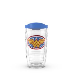 a glass cup with wonder logo on the side and a blue lid is sitting in front of a white background